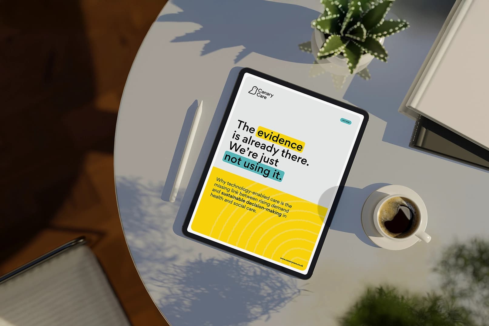 Image of a tablet on a coffee table, displaying Canary Care's white paper on technology-enabled care package decisions.